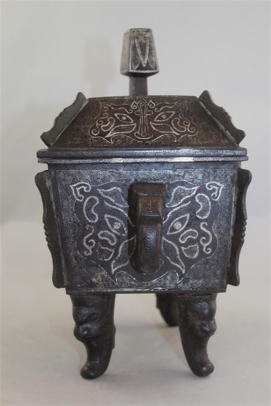 A Chinese iron and silver overlaid vessel and cover, Fangding, probably 19th century, 27.5cm